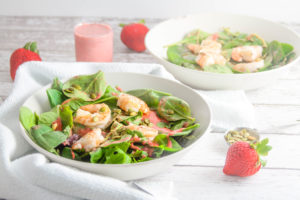 summer shrimp salad with strawberry mint algae oil dressing