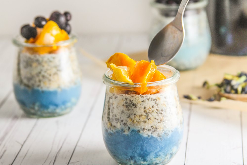 digging into overnight oats with butterfly pea tea